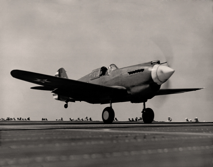 Curtiss P-40 on take off from USS Wasp (CV-7) on October 14th, 1940.